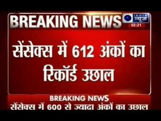 Sensex surges 612 points to hit new record high