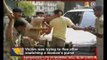 Surat: IPS officer thrashes purse-snatcher - NewsX