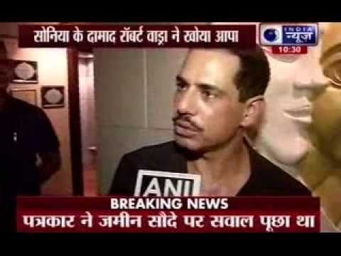 Robert Vadra pushes reporter mic away when asked on land deals