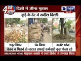 Garbage dumped on Delhi streets as sanitation workers strike over non-payment of wages