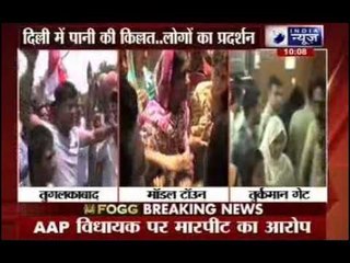 Arvind Kejriwal's effigy burnt over water crisis Tughlakabad, Delhi
