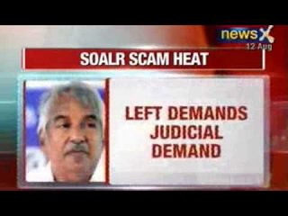 Tải video: News X: Kerala HC slams solar scam probe, Oommen Chandy rules out resignation