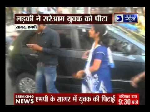 Woman beats up a youth for hitting her scooty with his car in Madhya Pradesh