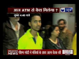 People waiting outside ATMs at Cannaught Place since early morning