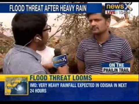 Cyclone Phailin: Cyclone Phailin slams coast, heavy rains in Odisha, Andhra