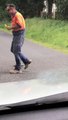 Man Keeps Icy Cool While Removing Snake