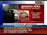 NewsX: Unidentified man protests outside parliament against passing of Lokpal Bill