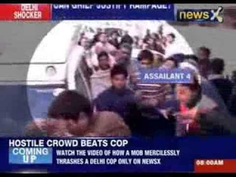 After 2 brothers were murdered, people thrash a cop in that area