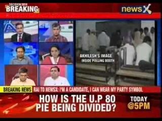 BJP objects to laptop with Akhilesh's photo in polling booth