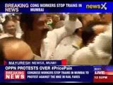 Congress workers stop trains in Mumbai