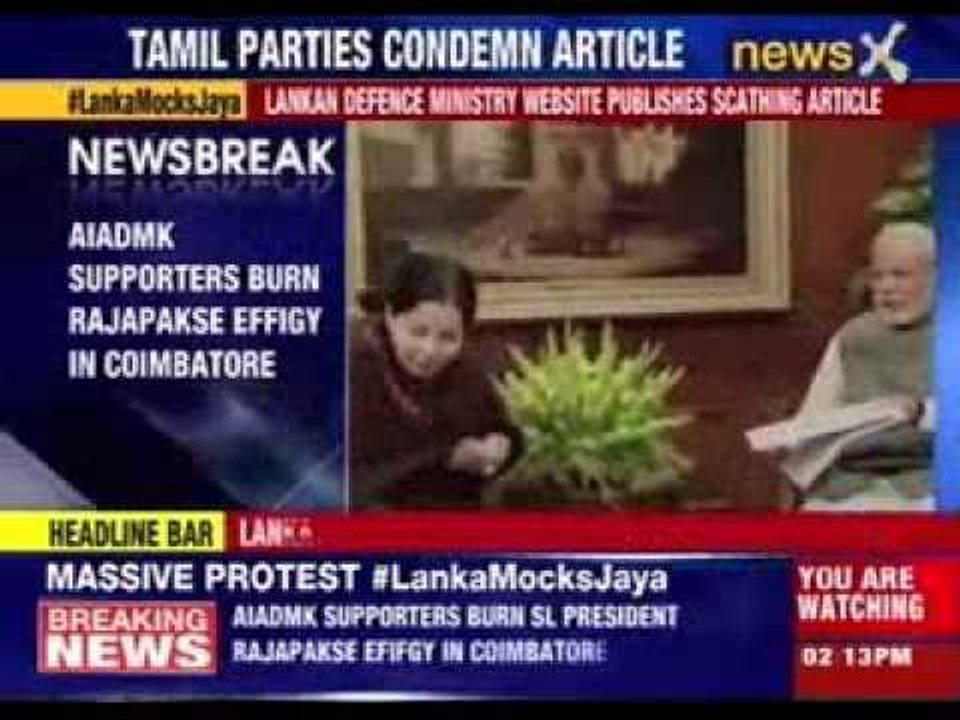 AIADMK supporters burn Rajapakse effigy in Coimbatore