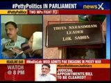 Two MPs fight for a room in the parliament
