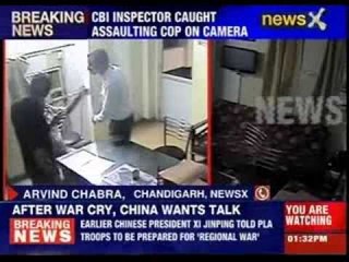 CBI inspector caught assaulting cop on camera