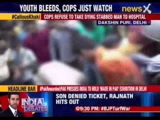 Cops quiz youth as he bleeds from multiple stab wounds