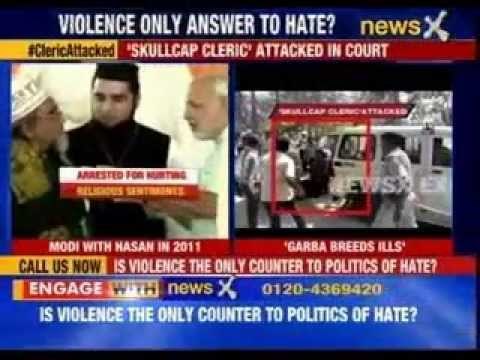 Muslim cleric Maulana Mehdi Hasan slapped by a youth in Thasra court