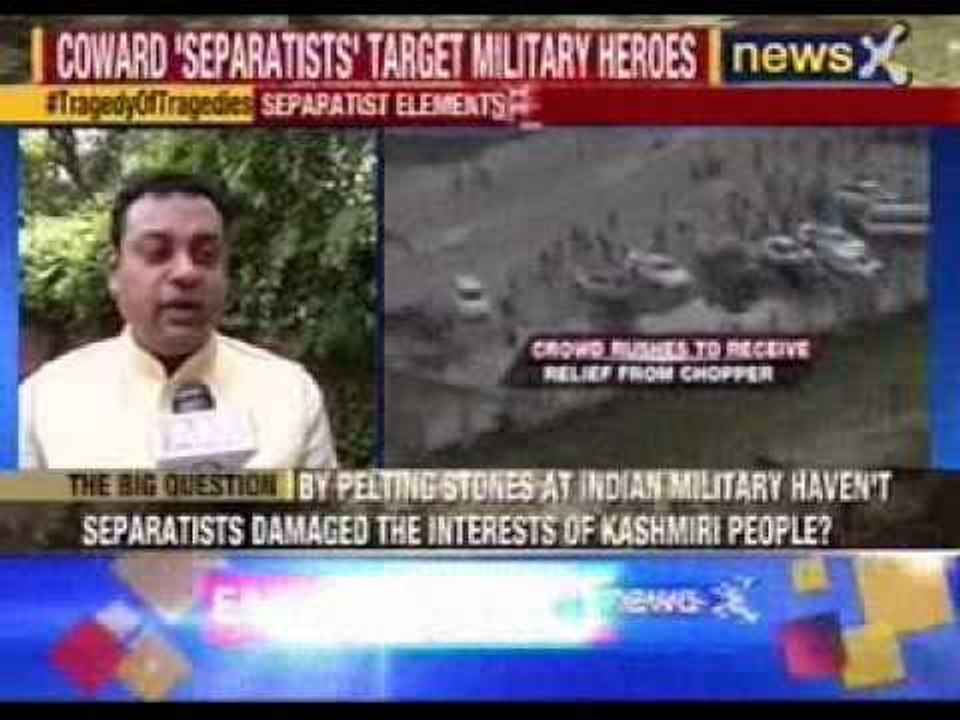 Army men distribute relief packets despite being target