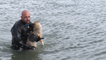 Police Diver Rescues Dog From Freezing Lake