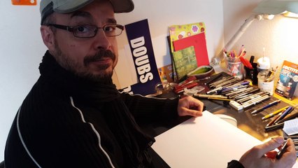 Le dessinateur François Roussel dessine  un piranha