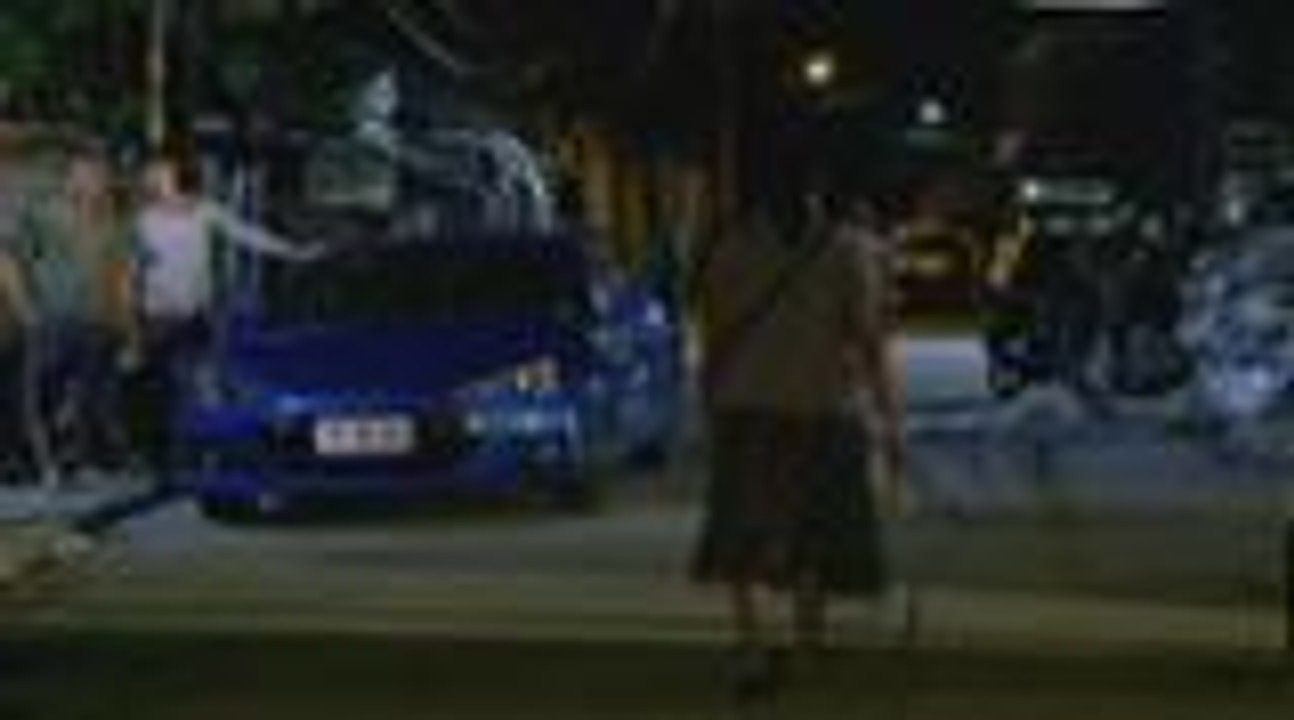 Christian fixes the flat tire of Grace