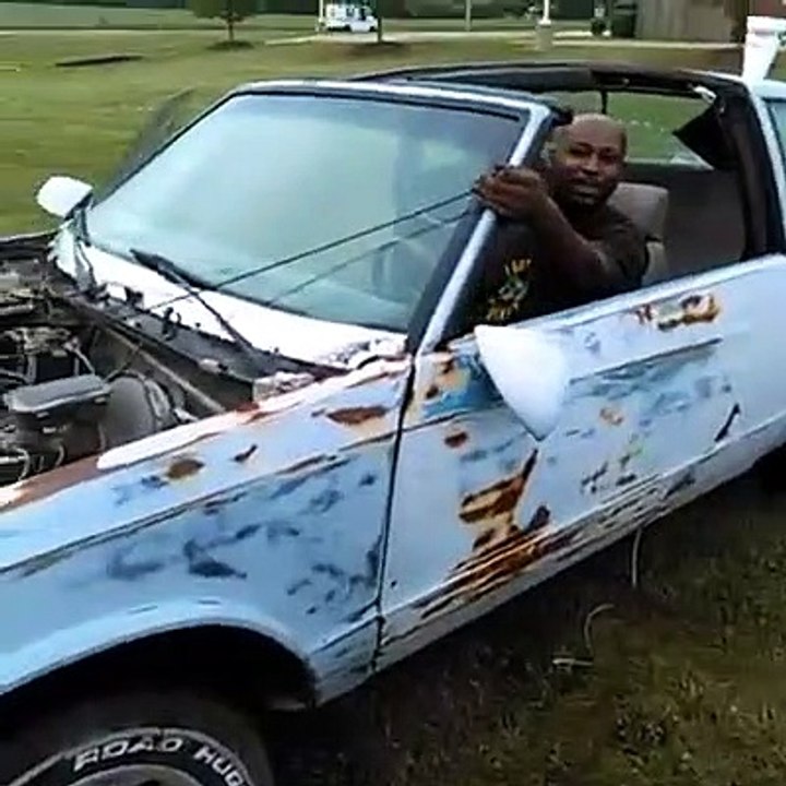Clunker Car Held Together by Shoestring