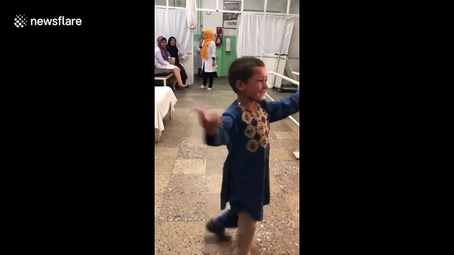 Afghan boy who lost leg to landmine dances for joy with new prosthetic limb