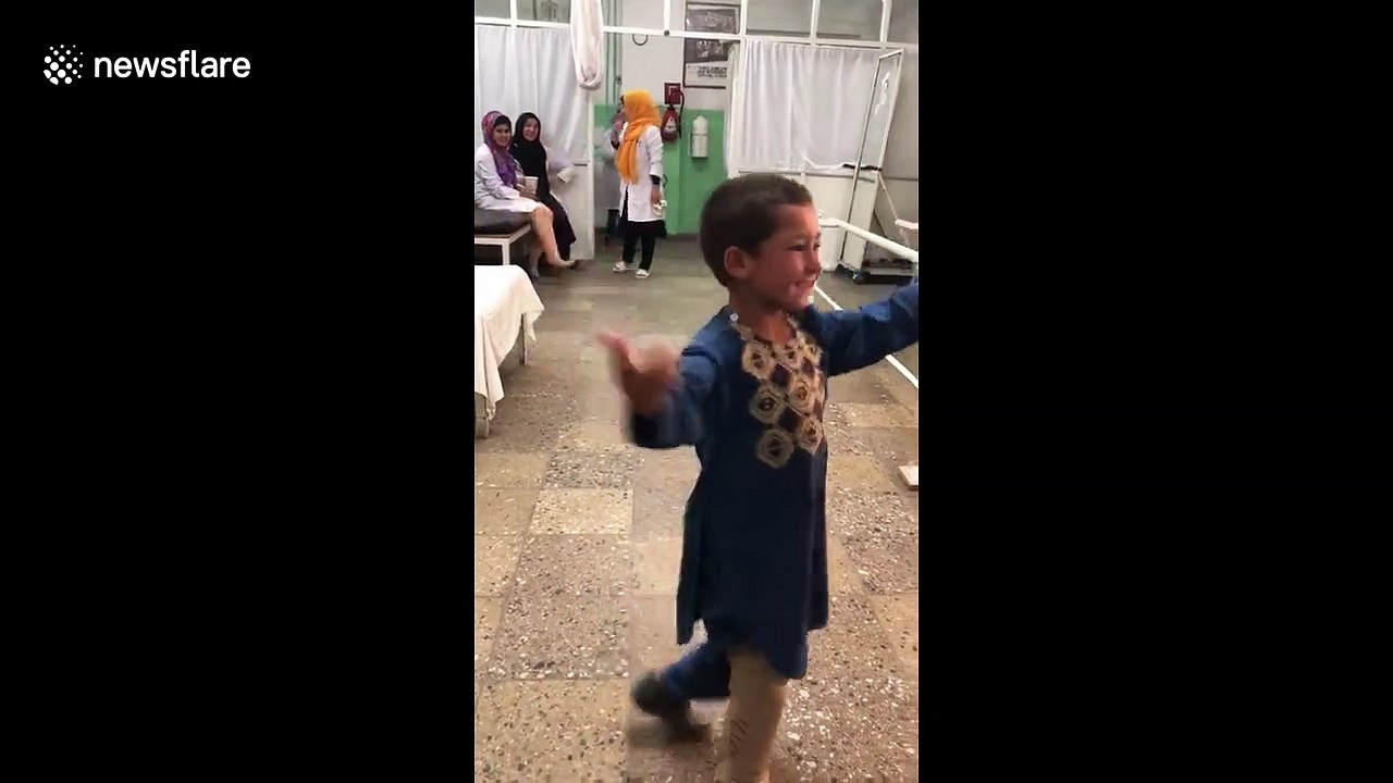 Afghan boy who lost leg to landmine dances for joy with new prosthetic limb