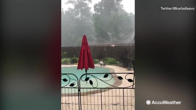 Downpours cause pool to overflow onto patio