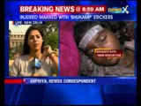 People injured in earthquake marked with ‘bhukamp’ stickers on their forehead in a Bihar hospital