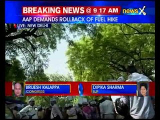 Tải video: AAP protests against fuel price hike, slams Modi government