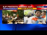 BJP party workers protest against AAP outside Delhi Assembly