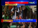 After being warned by Rajnath Singh, Pakistani flags again waved during a rally in Kashmir