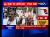 BJP workers protest against AAP over petrol, diesel VAT rate hike in Delhi