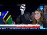 شباب العالم يرفعون أعلام بلادهم قبل بدء منتدى شباب العالم بشرم الشيخ
