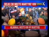 Delhi chief minister Arvind Kejriwal  meets martyrs kin in Punjab