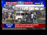 Video: Angry mob thrashes policeman in Vadodara