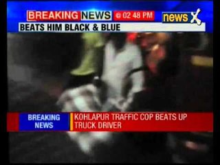Cop beats up truck driver in Kohlapur