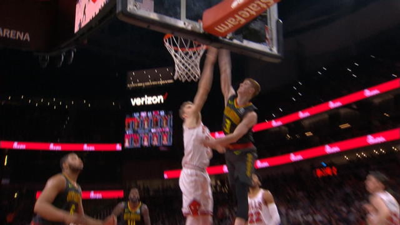 Huerter grabs own rebound, slams home