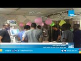 الفريق الطبي بمستشفى أسوان الجامعي ينظم حفل عيد ميلاد لمريض بشلل رباعي
