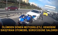 Ölümden dönen motosikletli, kendisini sıkıştıran otomobil sürücüsüne saldırdı