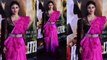 Mouni Roy flaunts her hot pink Saree at the launch of RAW trailer: Watch Video | FilmiBeat