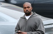 Kanye West supporting Khloe Kardashian