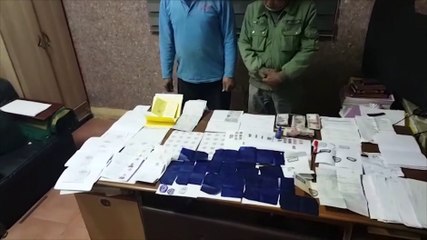 سقوط شخصين يزوران رخص المرور فى قبضة رجال الأمن