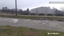 Creek turns into dangerous rapid river after heavy rainfall