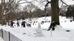 People flock to snowy Central Park for some winter fun