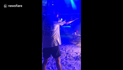 Man stacks it after tripping on flaming skipping rope