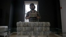 Guy Turns Cash Bricks Into Works Of Art
