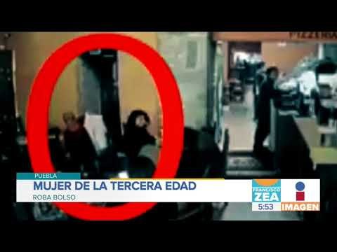Captan a mujer de la tercera edad robando el bolso de otra mujer | Noticias con Francisco Zea