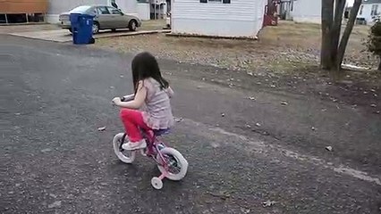 Rebekah riding her bicycle