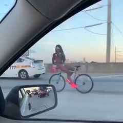 Miami man rides his bike backwards down the freeway!