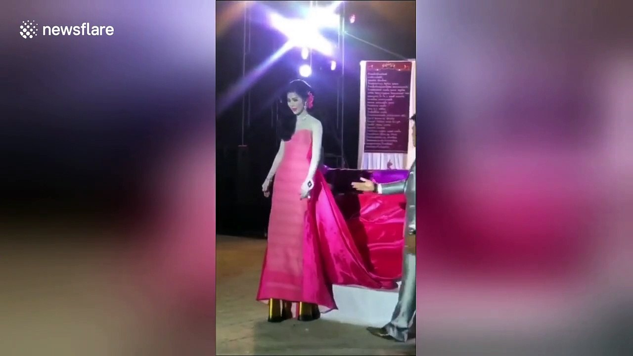 Thai woman takes a tumble when showing off her mega 18-inch heels